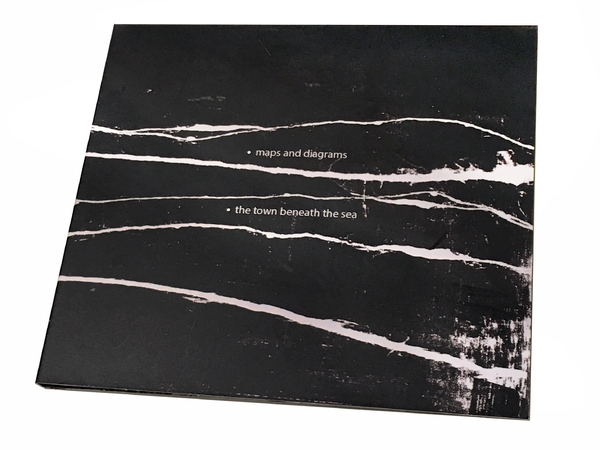 CD-bor&iacute;t&oacute; &uacute;jratervez&eacute;s: MAPS AND DIAGRAMS - THE TOWN BENEATH THE SEA